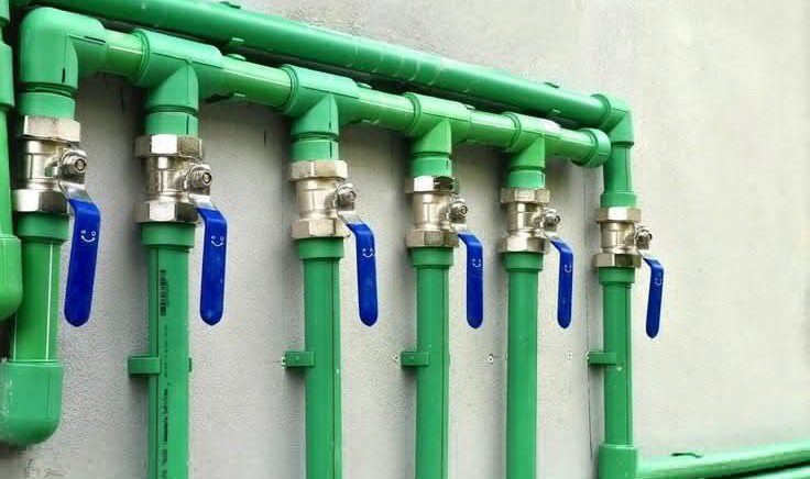 Row of plumbing shut-off valves